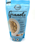 A blue zippered bag which has a window in the shape of a circle to reveal the granola underneath; a mix of oats, almonds, and sunflower seeds.