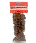 A clear bag of spiced almonds with a red label on top.