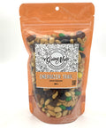 A mixture of various nuts and raisins mixed together in an orange bag with a clear front.