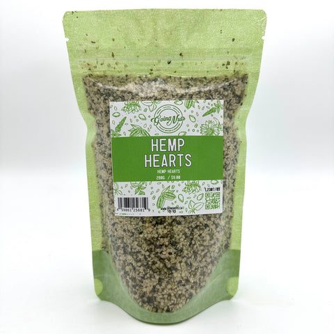 A green zippered bag filled with hemp hearts with a clear front and a green and white label on the front