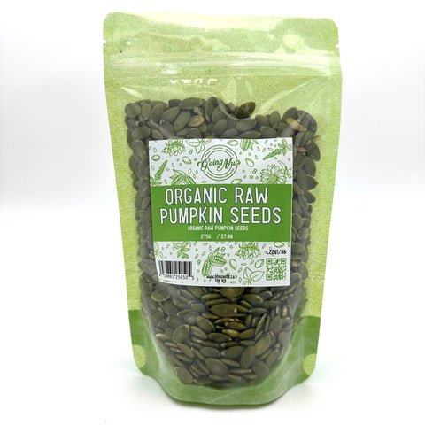 A light green zippered bag filled with organic raw pumpkin seeds with a clear front and a green and white label on the front