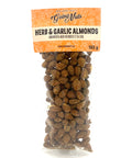 A clear bag of spiced almonds with an orange label on top.