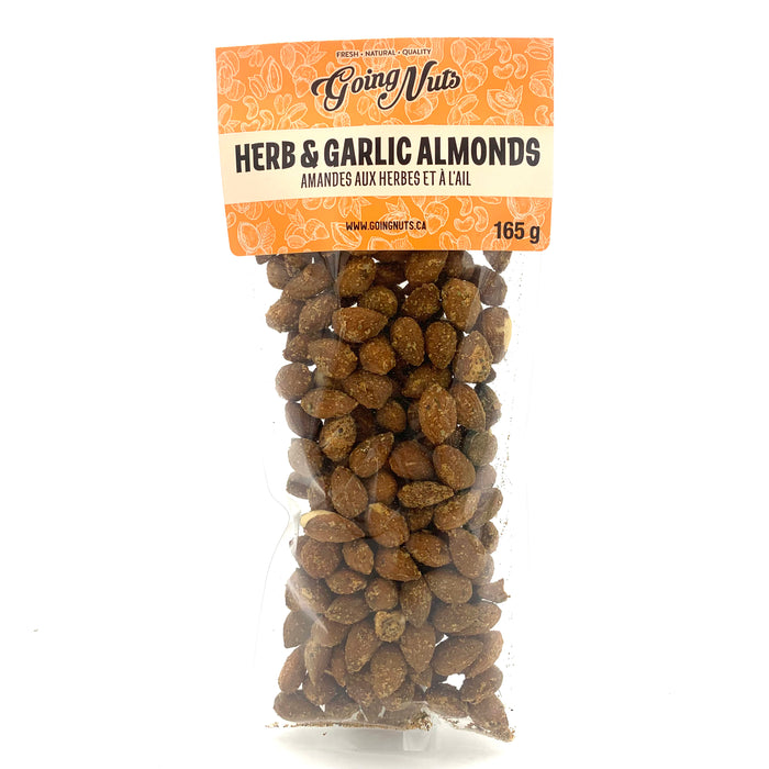 A clear bag of spiced almonds with an orange label on top.