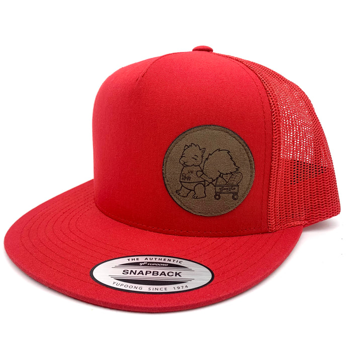 A red cap with a mesh back, with a brown logo of a squirrel pulling a wagon on the right half.