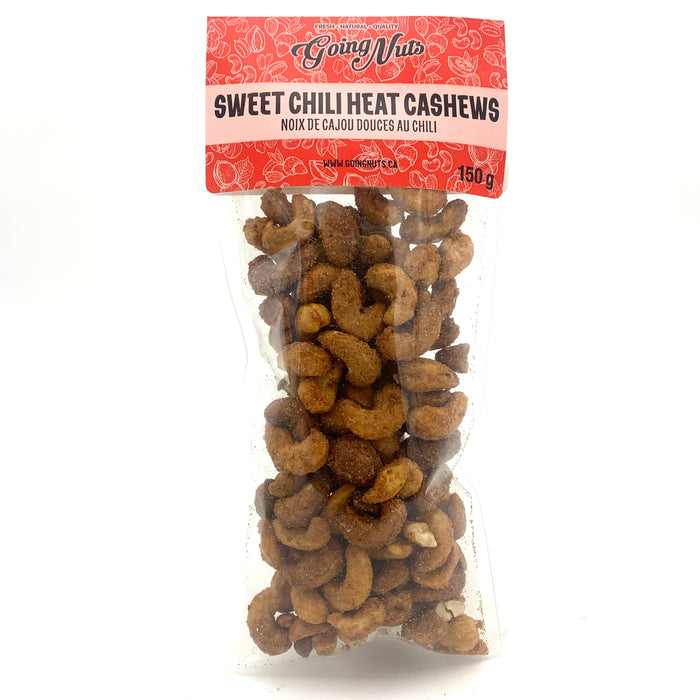 A clear bag of spiced cashews with a red label on top.