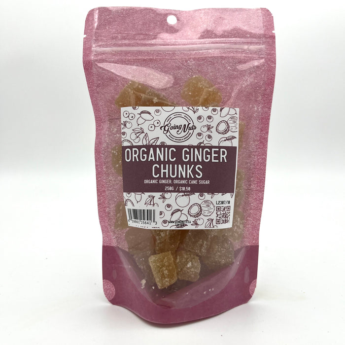A pink bag with a clear front is filled with chunks of dried ginger with a white and pink label on the front 