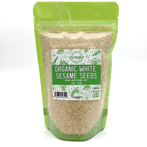 A green zippered bag filled with white sesame seeds with a clear front and a green and white label on the front