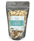 A black zippered bag filled with sliced almonds with a clear front and a teal and white label on the front